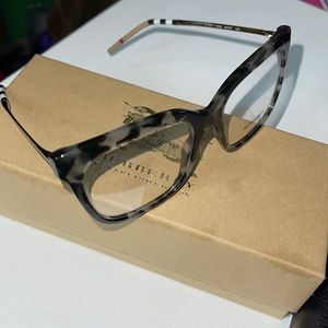 Burberry eye glasses, lightly worn and still new